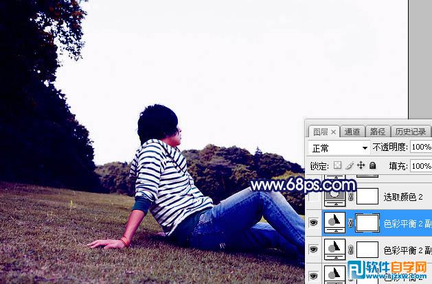 PS給唯美草坪上的人物加些紫色霞光